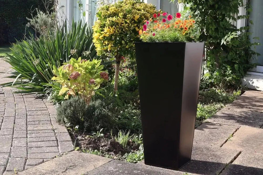 Tall Flared Planter On Patio With Plants