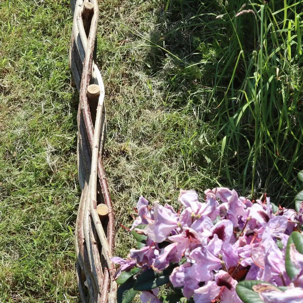 2.4 metre long handwoven hazel hurdle lawn edging top view by Woven Wood Tulipy