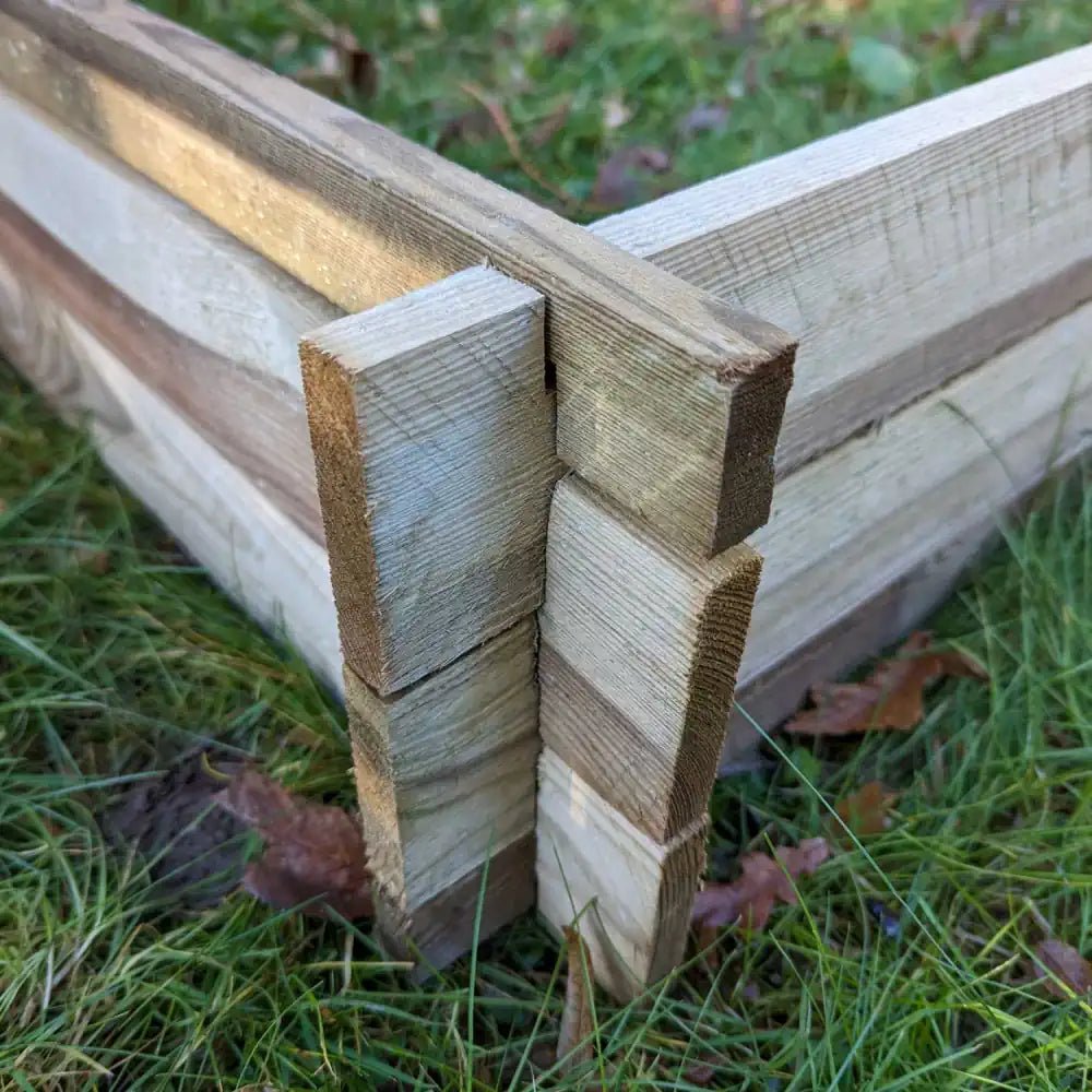 Wooden Chester Raised Beds on Woven Wood