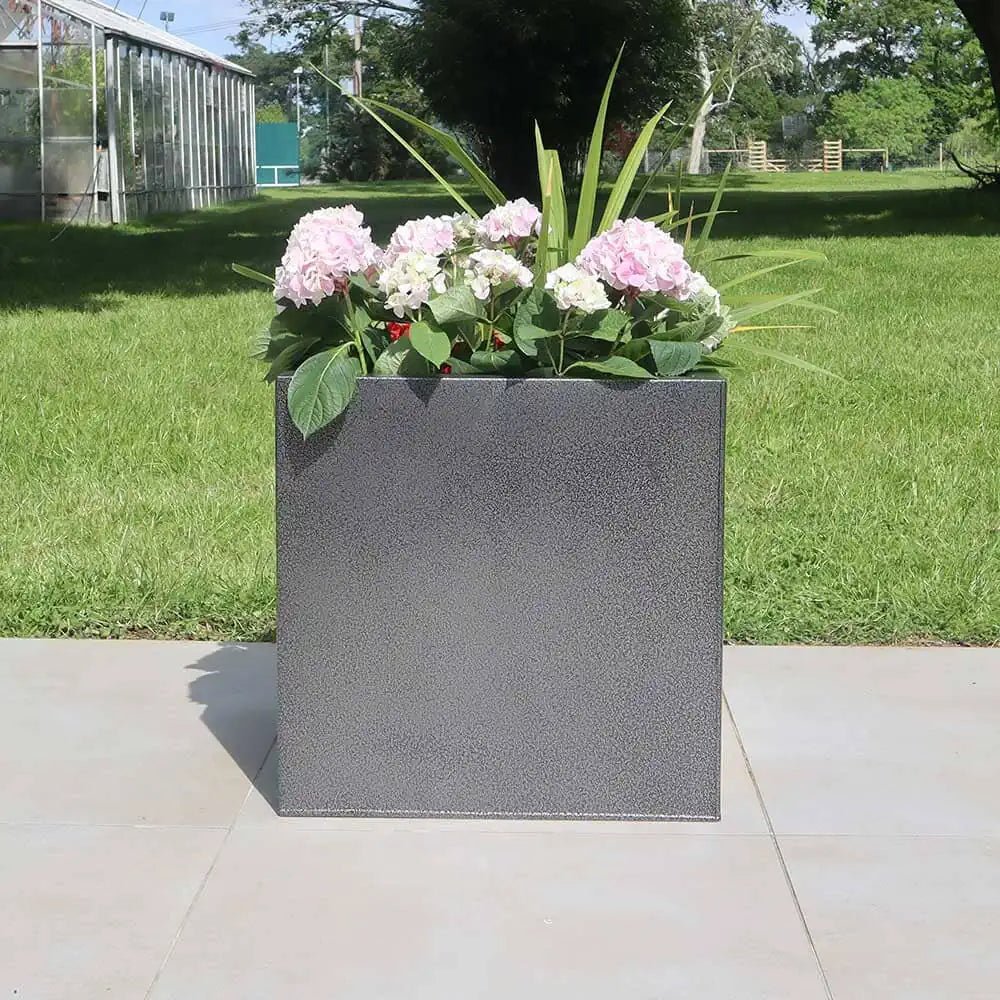 rough planters arranged in a symmetrical pattern