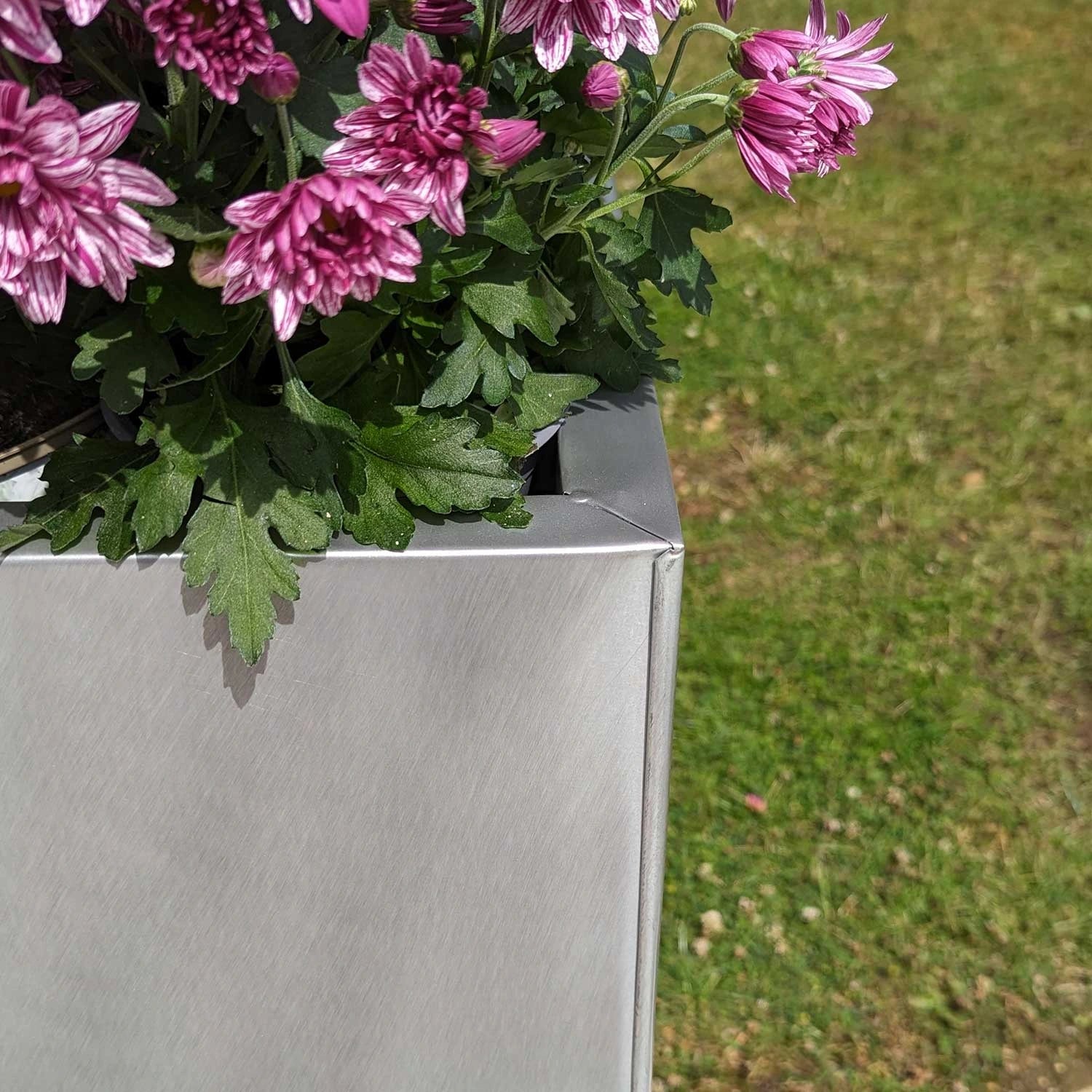 long tall trough silver planter closeup