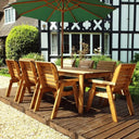 Savor delicious meals or drinks with friends on this versatile 8-seater patio set, featuring comfortable seating and a green parasol.