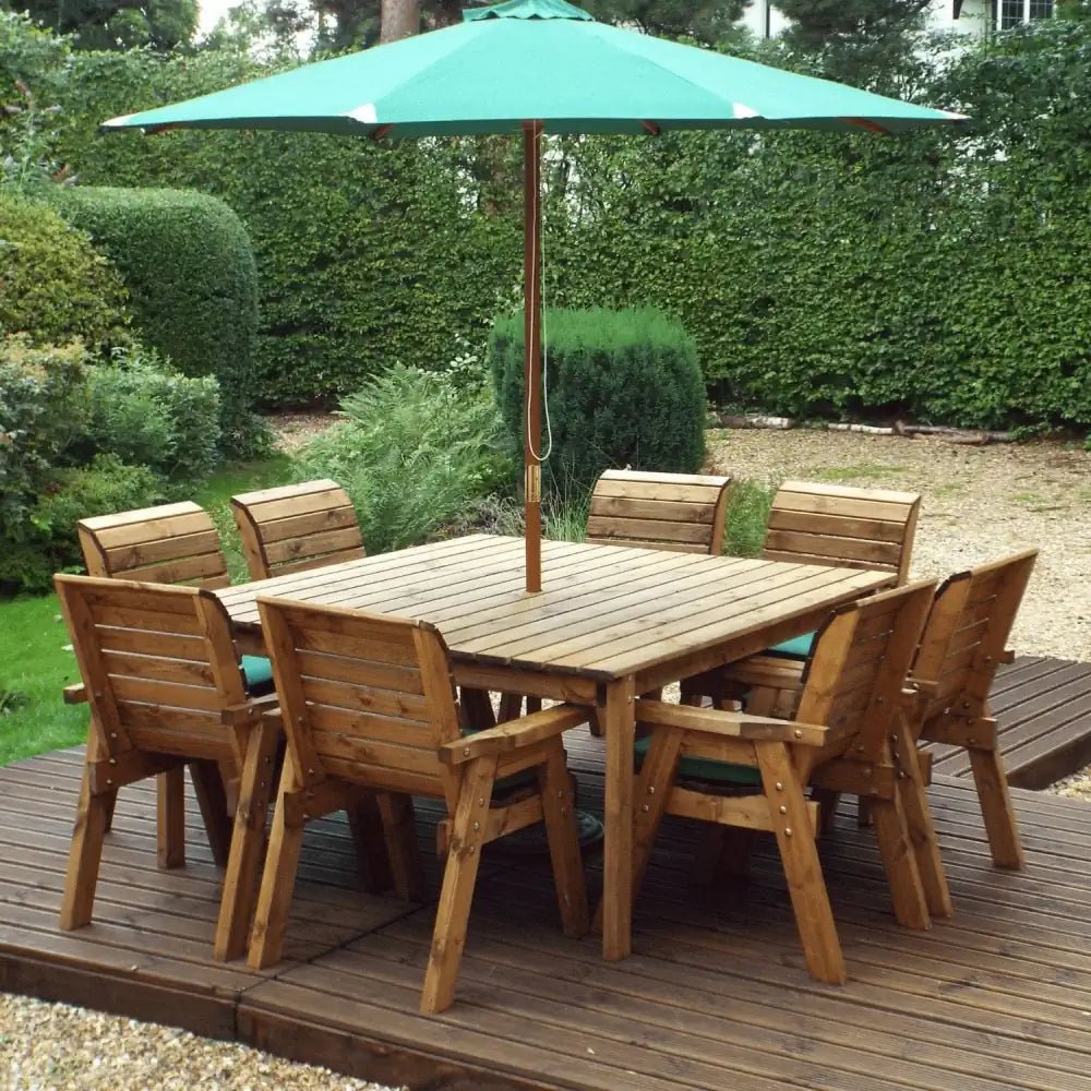 Unwind under the shade of a green parasol in this inviting 8-seater patio set, built for comfort and durability.