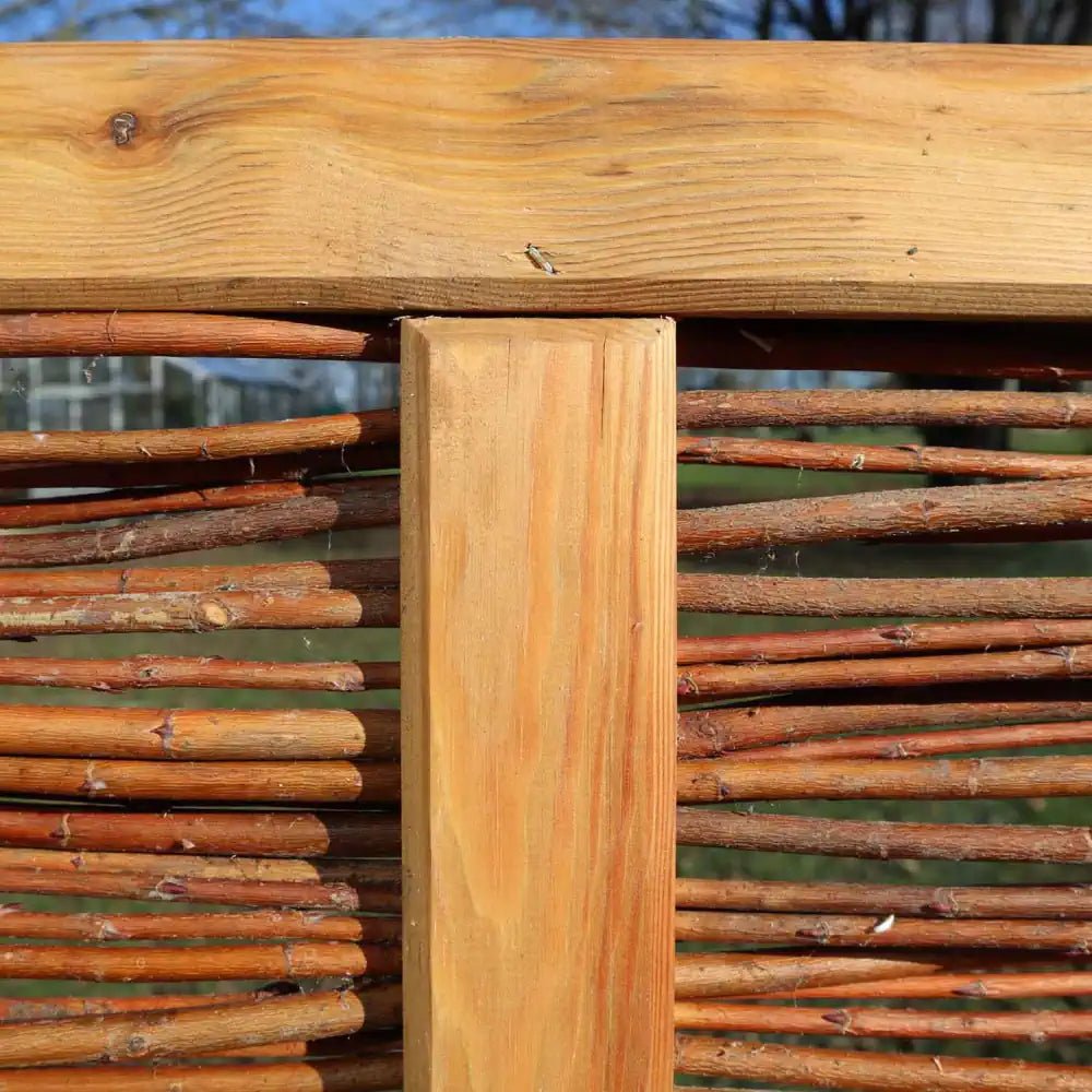 Choose sustainable beauty with Willow Hurdle Fencing, offering privacy and natural aesthetics.