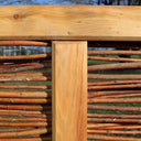 Choose sustainable beauty with Willow Hurdle Fencing, offering privacy and natural aesthetics.