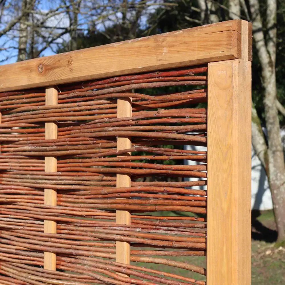 Transform your garden into a tranquil haven with the rustic charm of Willow Hurdle Fencing panels.