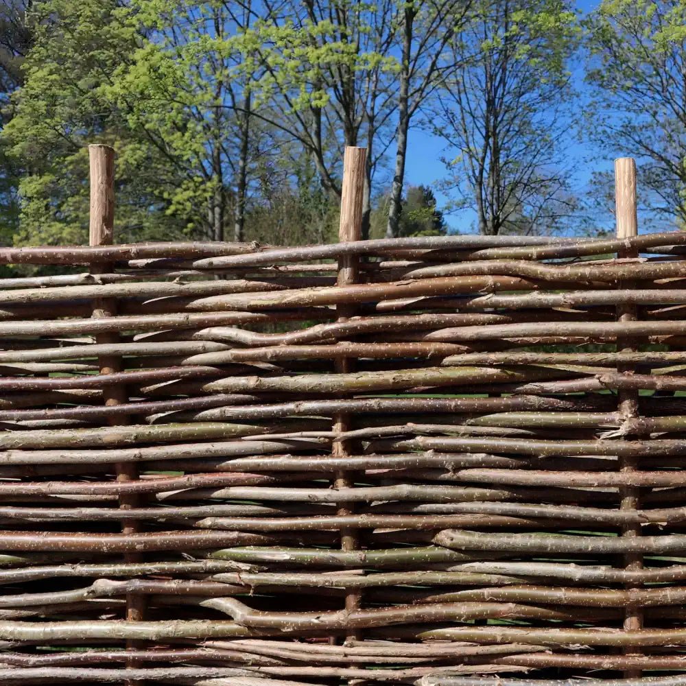 Woven Wood's hazel hurdles are perfect for creating a natural and rustic boundary in your garden