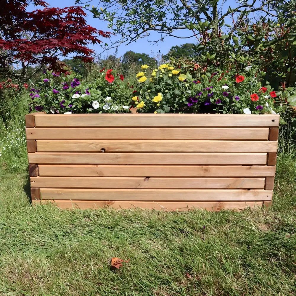 Hardwood planter box: A durable hardwood planter box 70cm Pine