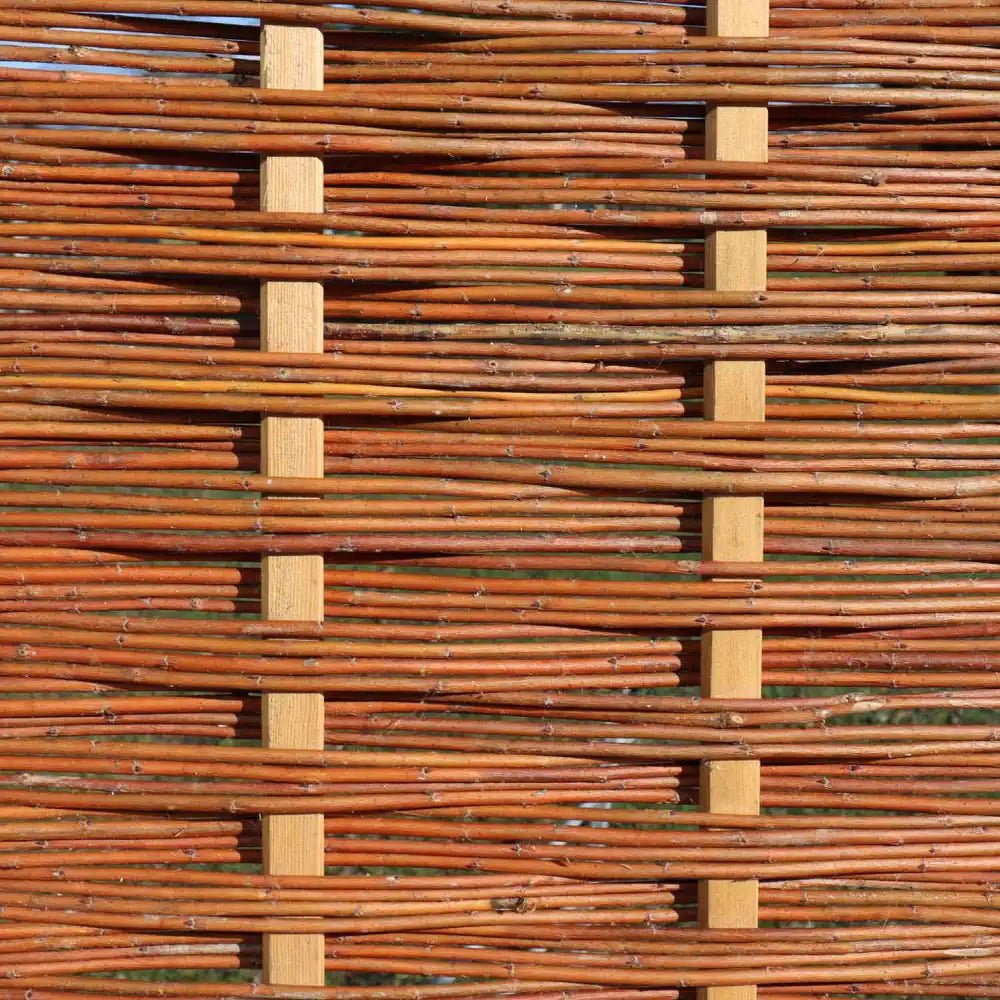 Enjoy the beauty and sustainability of Willow Hurdle Fencing panels, a unique choice for garden borders.