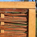 Experience the eco-friendly appeal of Willow Hurdle Fencing, crafted from renewable materials.