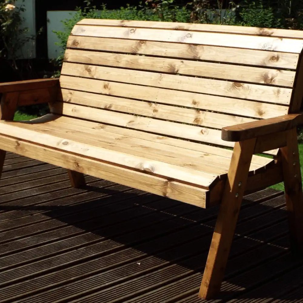 Let the sunshine warm your face while relaxing on this comfortable Wooden Garden Bench, a must-have for any garden.