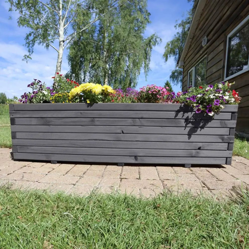 Wooden planters are a versatile option for any plant, indoors or outdoors.