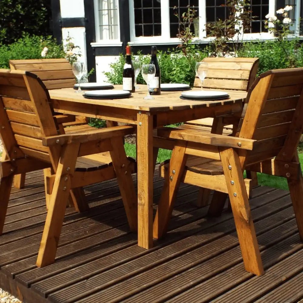 Dine in style with a luxurious Patio Dining Set, featuring hand-crafted teak furniture and plush cushions.