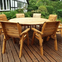 Enjoy endless summer evenings with a comfortable Patio Dining Set featuring weather-resistant Wooden Furniture and a Garden Parasol.