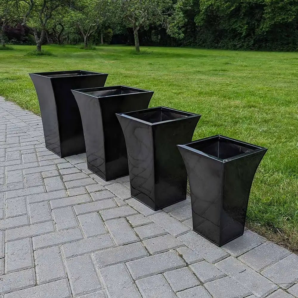 Round planters surrounding a water feature