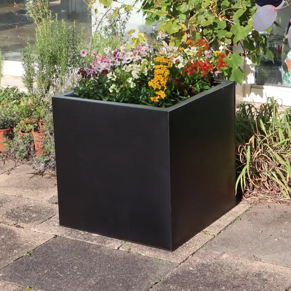 Beautify your surroundings with the charm of large square planters.