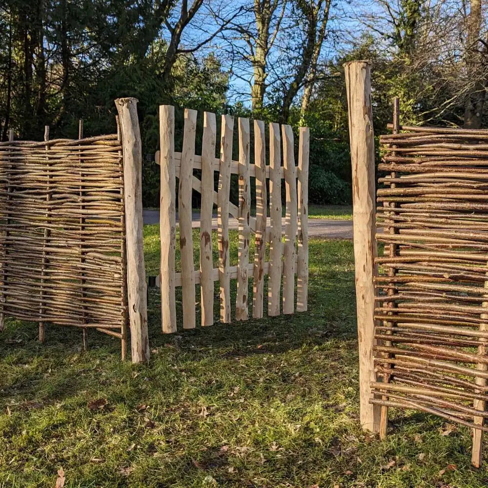 Natural fencing gate crafted from reclaimed wood.