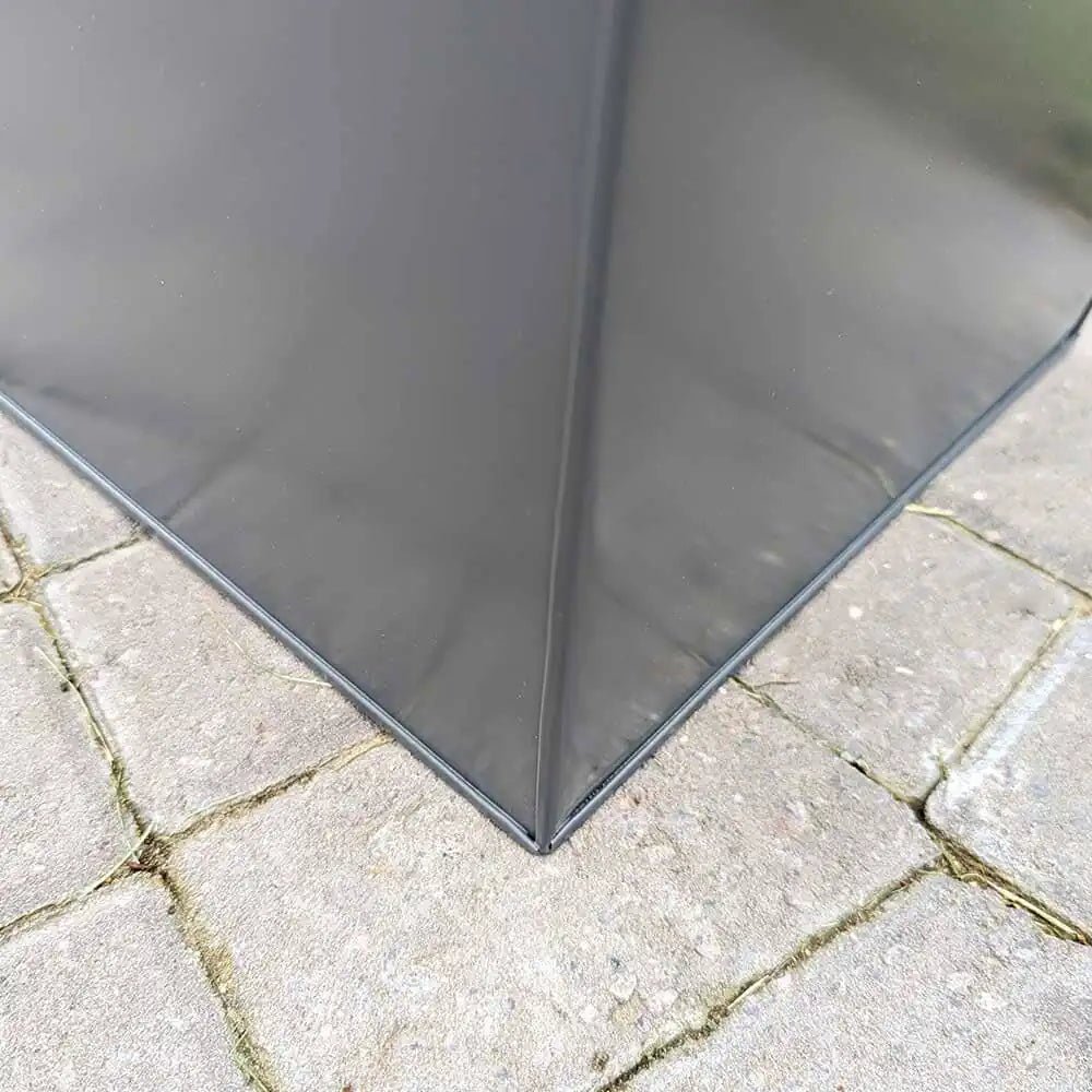 Large plant pots creating a privacy screen