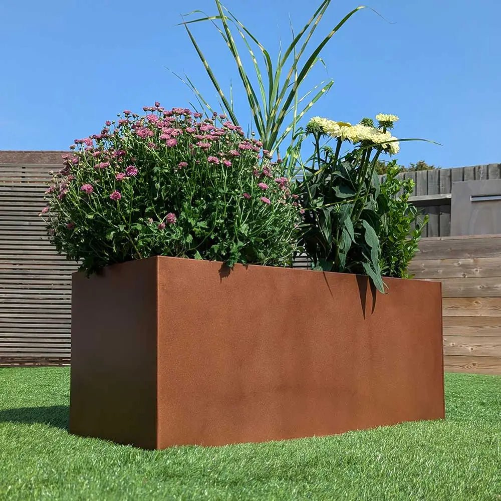 copper brown zinc trough planter with plants