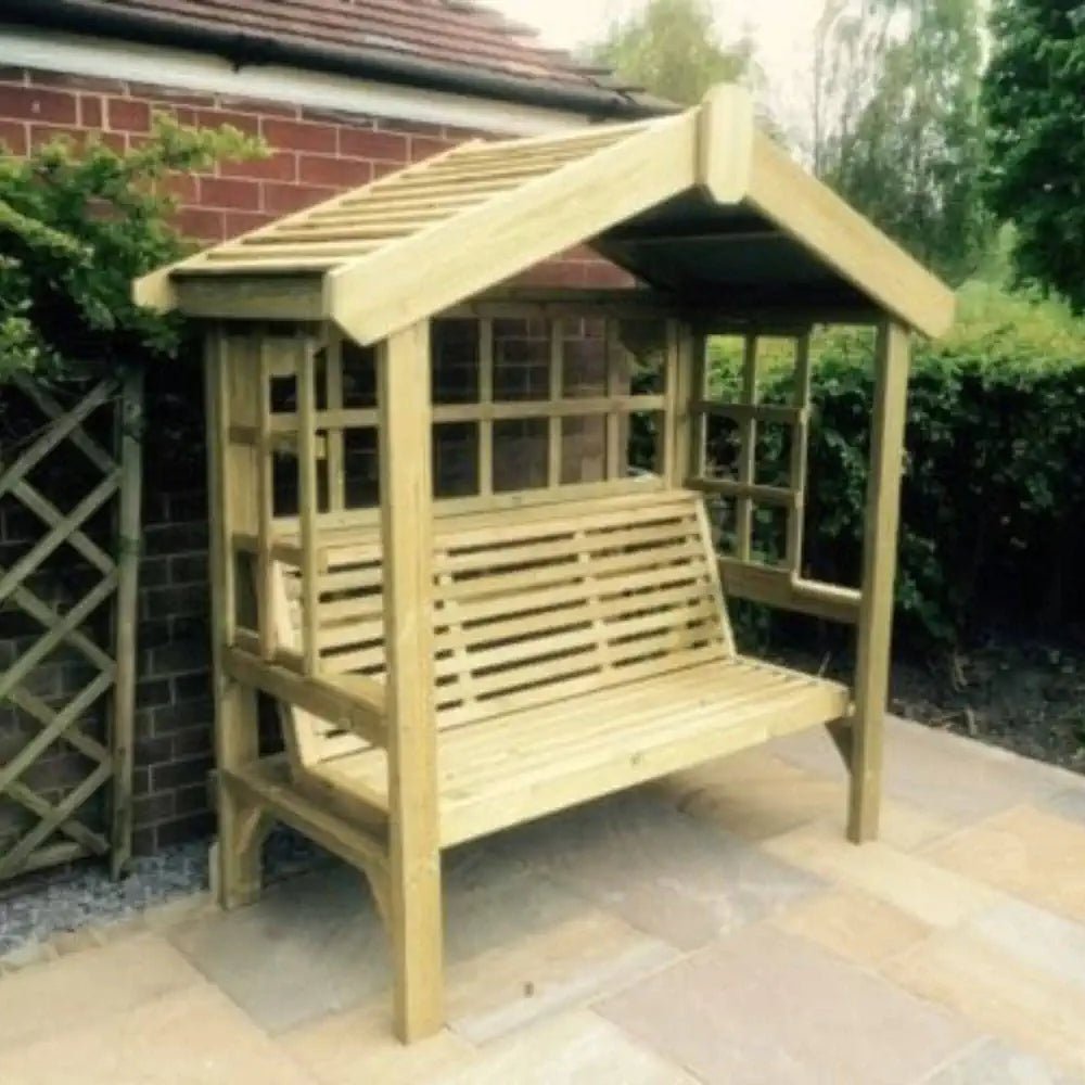 Corner arbour nestled amidst blooming flowers, creating a peaceful retreat.