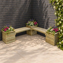Corner Planter Bench planted in a garden setting