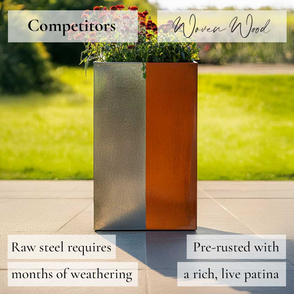 Two tall planters, one raw steel and one pre-rusted with a live patina, on a patio with grass and flowers in the background.