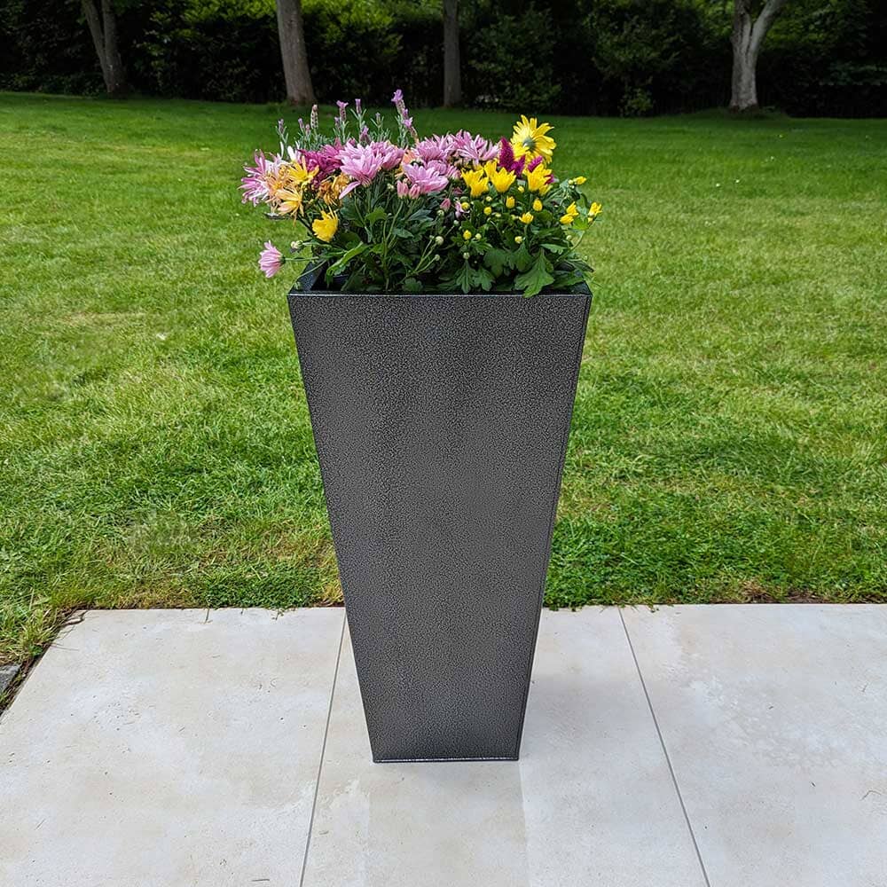 Rows of trough planters filled with vibrant flowers