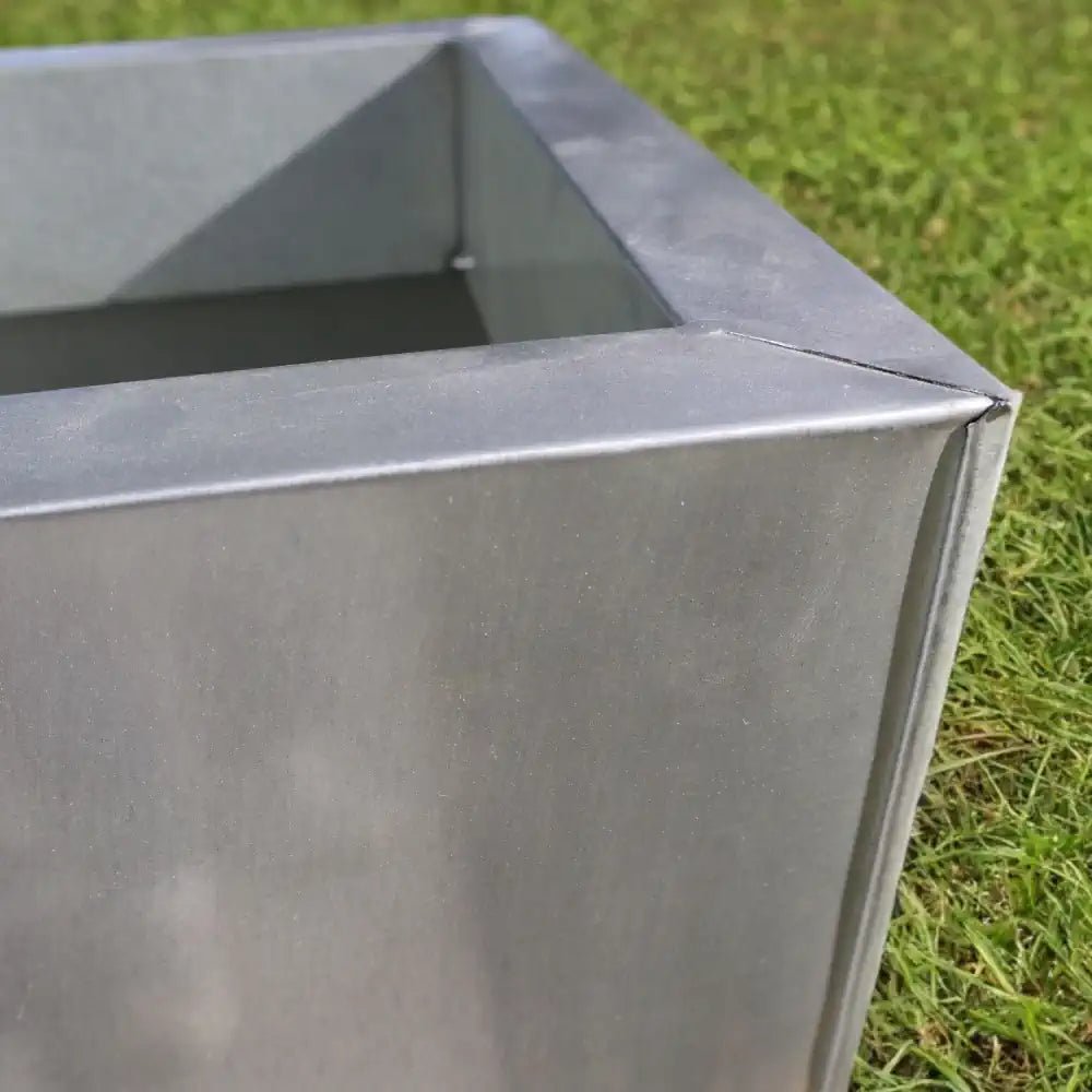 Contemporary charm with flared cube planters.