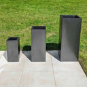 Oversized outdoor planters making a statement on a porch
