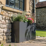 Zinc planters by the poolside