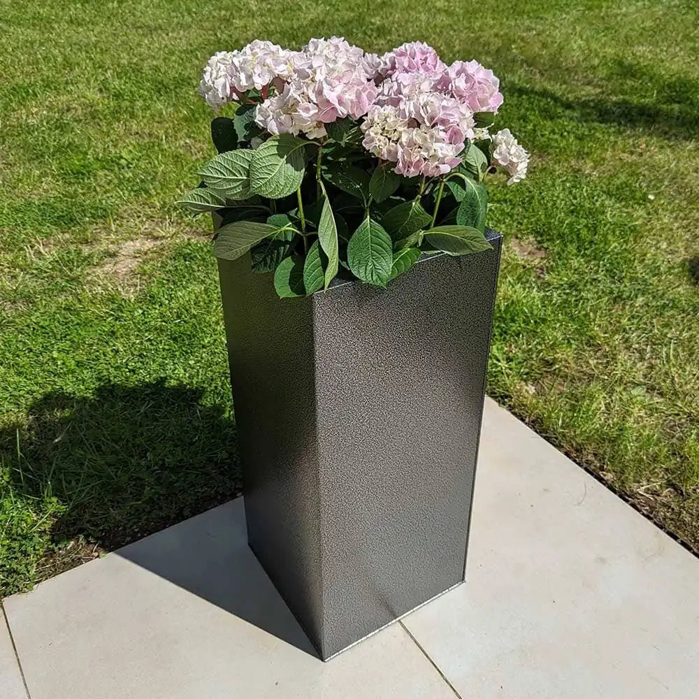  Assorted zinc planters adding flair to a rooftop garden