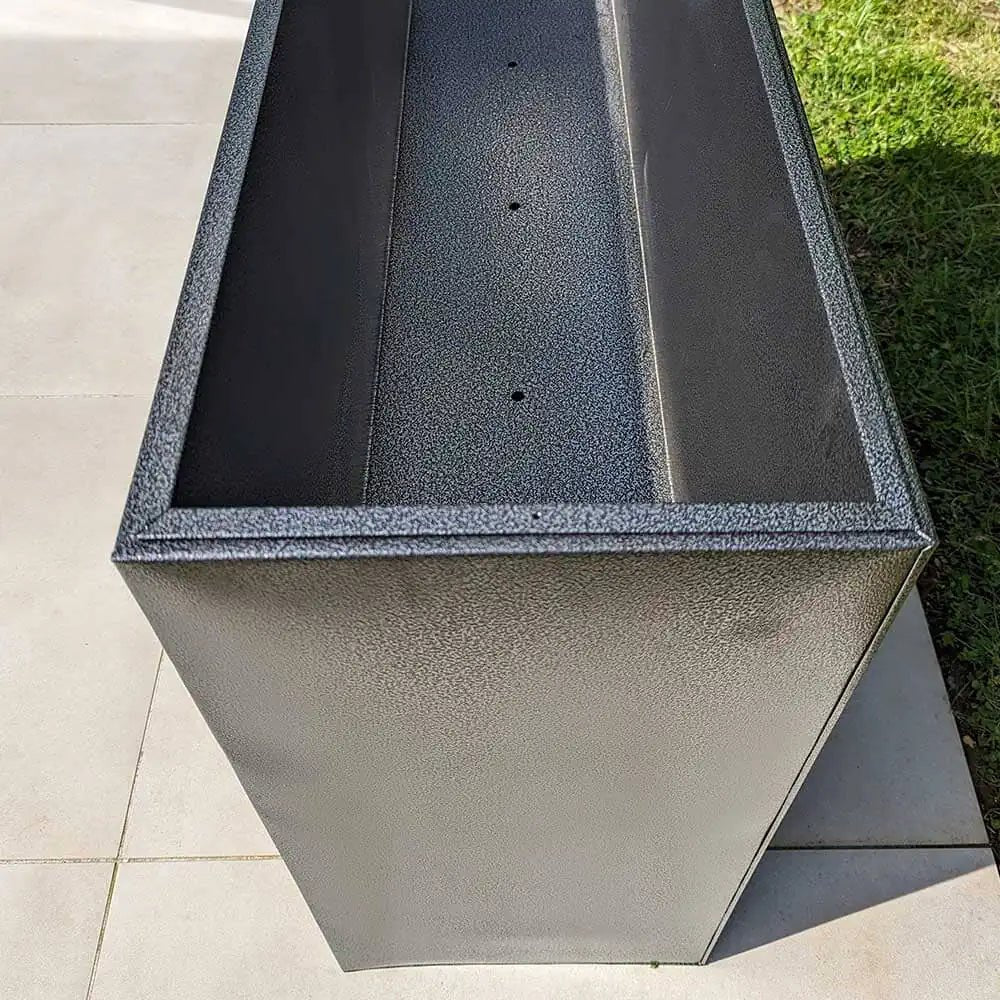 Trough garden planters on a landscaped lawn