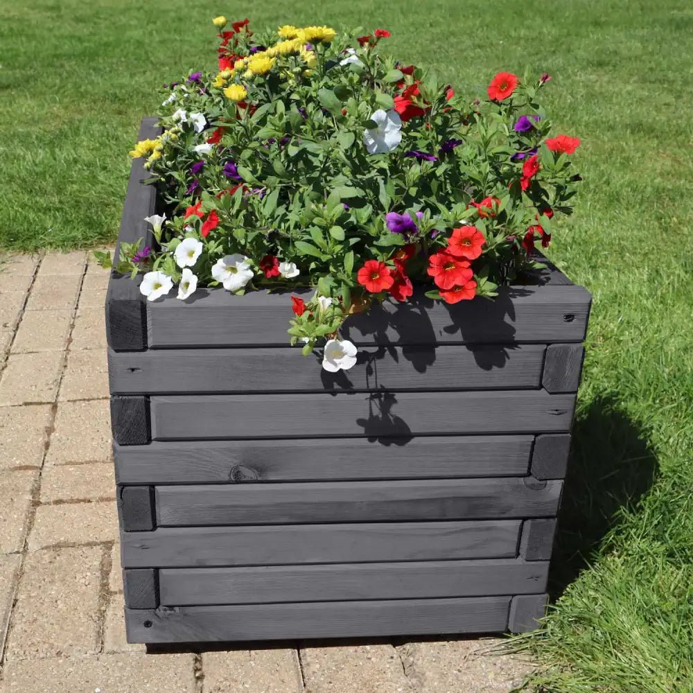 Large wooden planter brings a touch of nature and functionality to your balcony or patio.