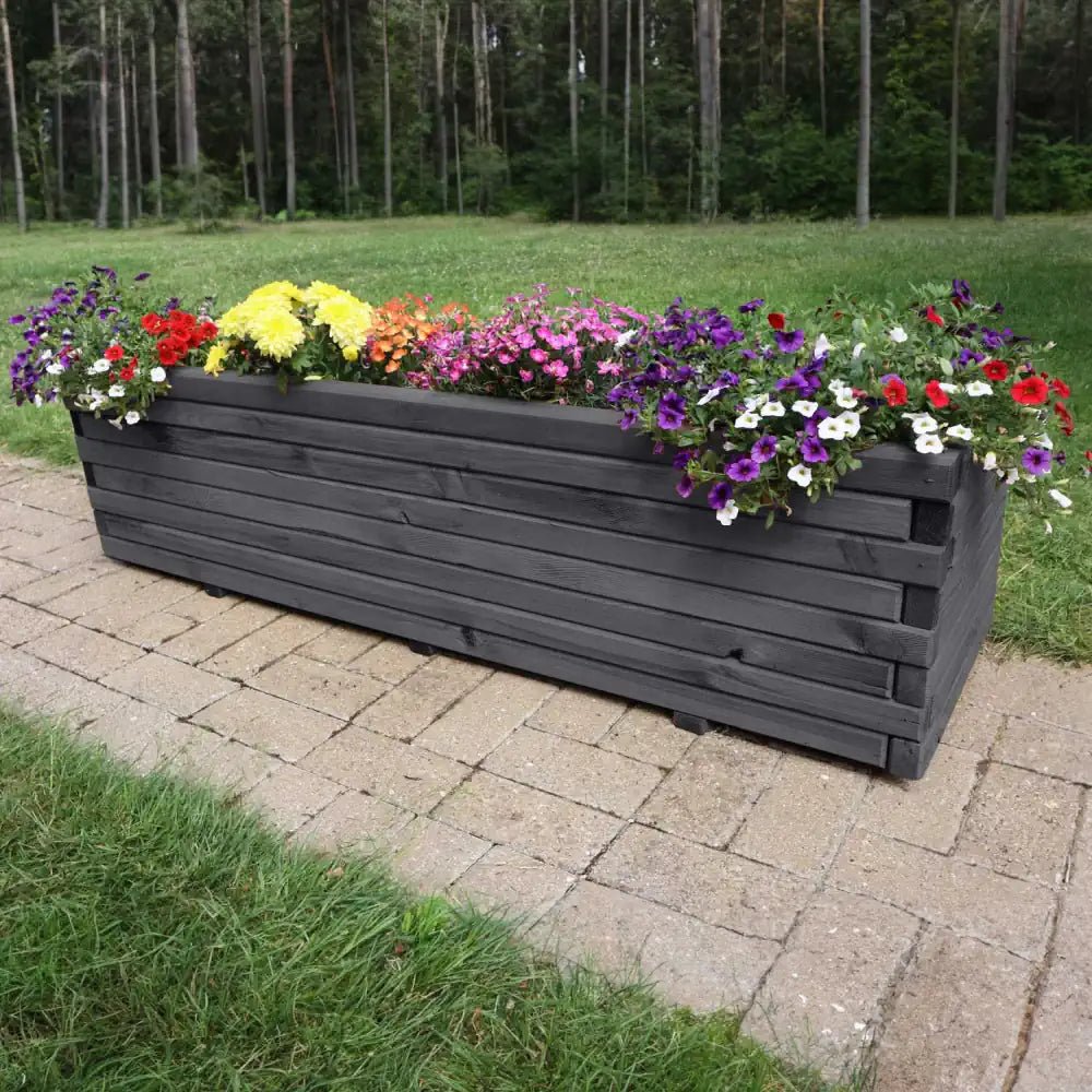 Create a charming ambiance with decorative wooden planters featuring intricate designs.