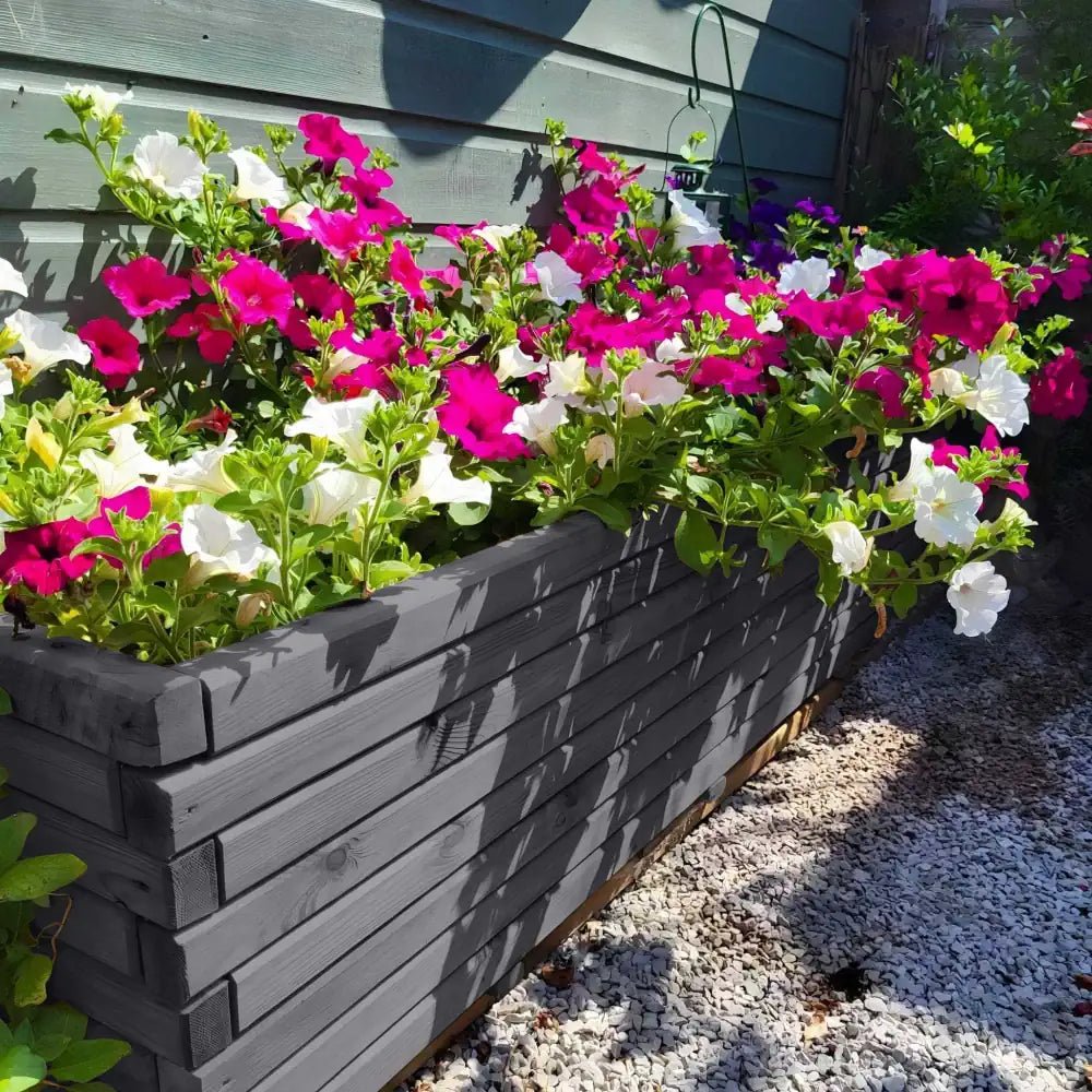 Outdoor garden planters in wood offer lasting durability and natural charm for your outdoor space.