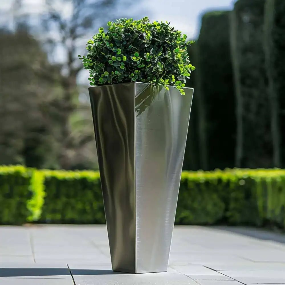 Sleek flared cube planters for modern gardens.
