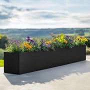 Flatpacked zinc galvanised trough planter, matte black, 200 lifestyle patio