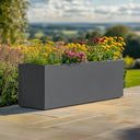 Flatpacked zinc galvanised trough planter, matte grey, lifestyle patio 2