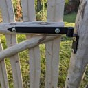 Natural fencing gate adding privacy to your outdoor retreat.