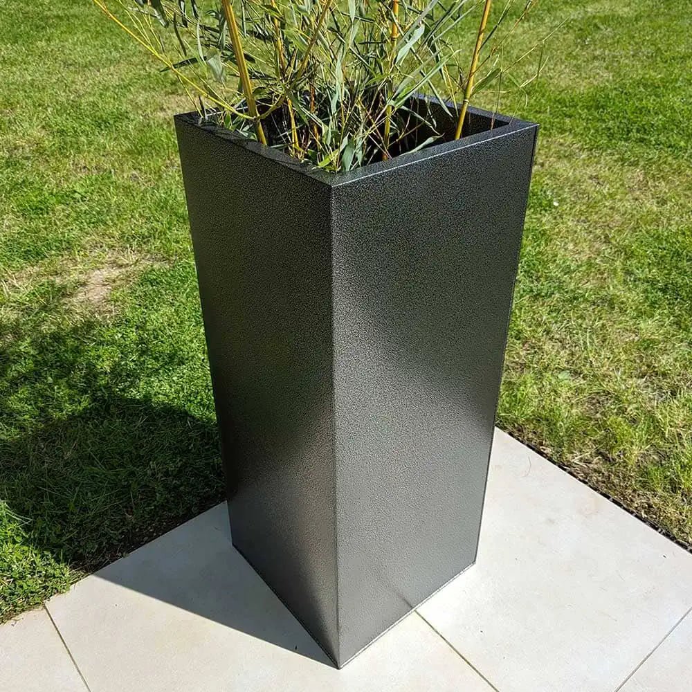 Trough planters with fresh herbs growing inside