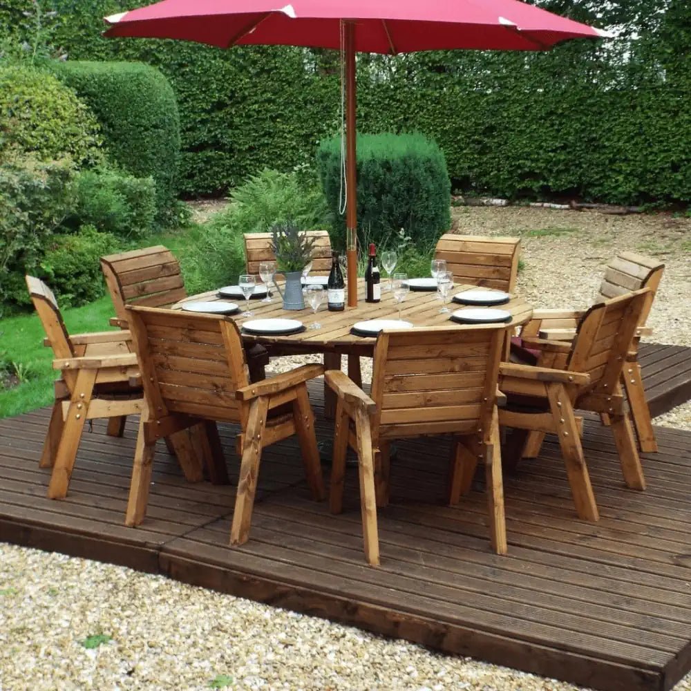 Transform your patio into a serene oasis with a Wooden Garden Furniture Set and a stylish Garden Parasol.