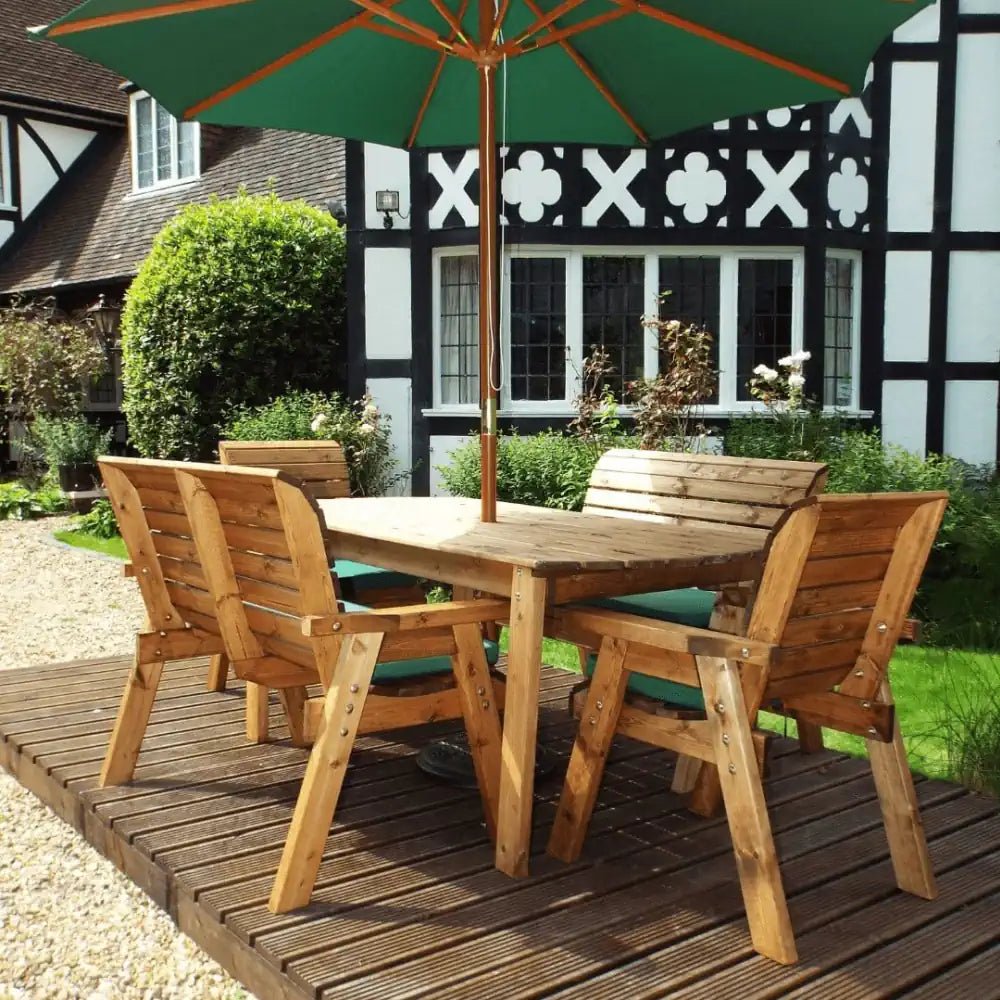 Transform your patio into a stylish retreat with this inviting lawn furniture set, featuring comfortable cushions and a sturdy wooden table.
