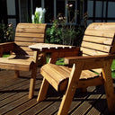 Relaxation spot: A wooden love seat inviting you to unwind in the garden.