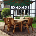 Wooden Dining set with green parasol by WOven WOod