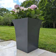 Outdoor plant pots adorning a backyard patio