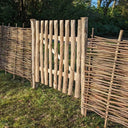 Wooden garden gate guiding the way to serenity.