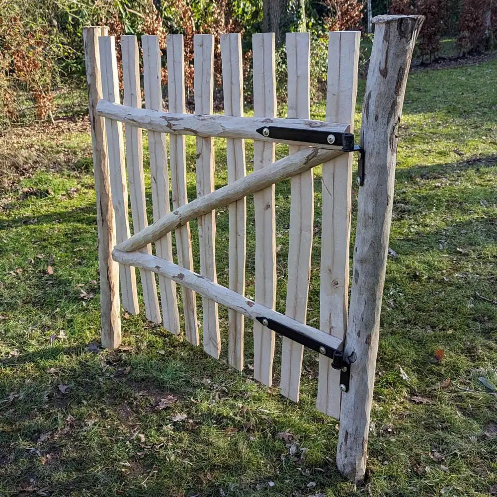 Hazel hurdle gate blending seamlessly with nature.