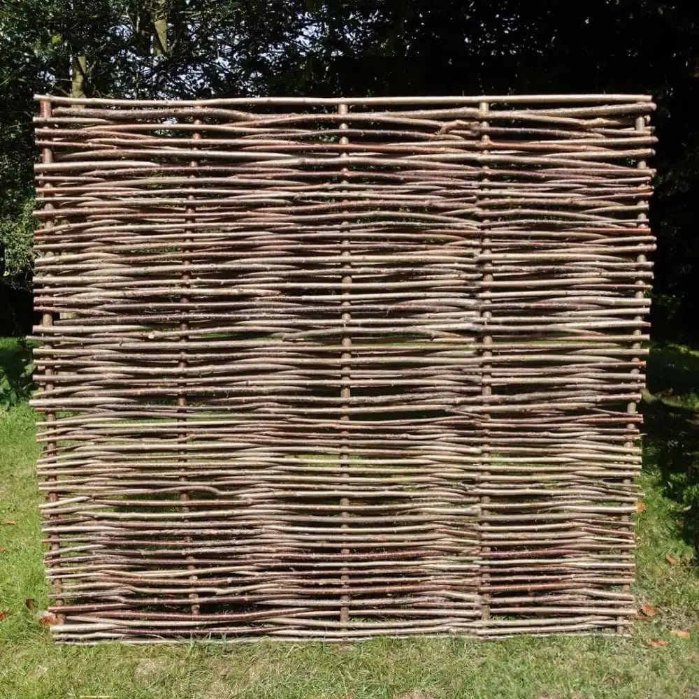A close-up view of hazel fencing panels, showcasing their natural beauty and texture.