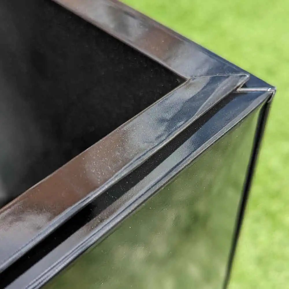 A sleek and modern extra large outdoor planter stealing the spotlight.