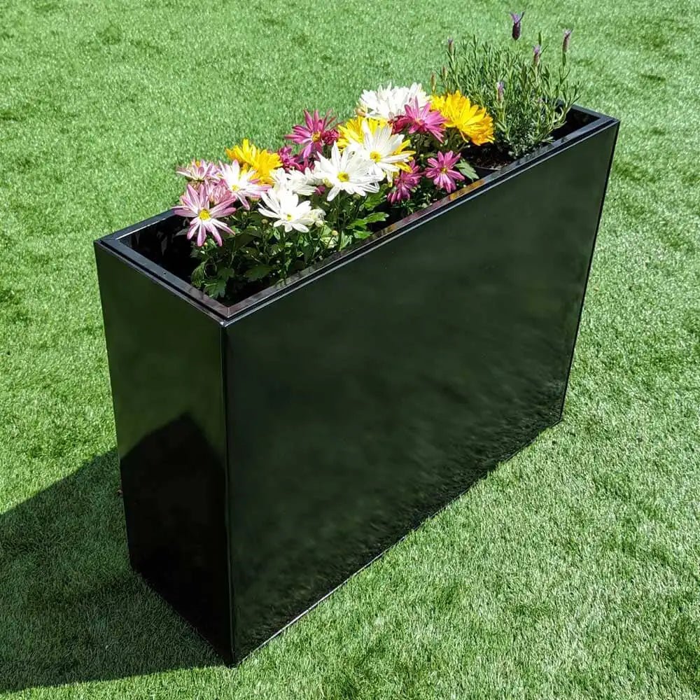 Transform your space with the clean lines of tall rectangular planters.